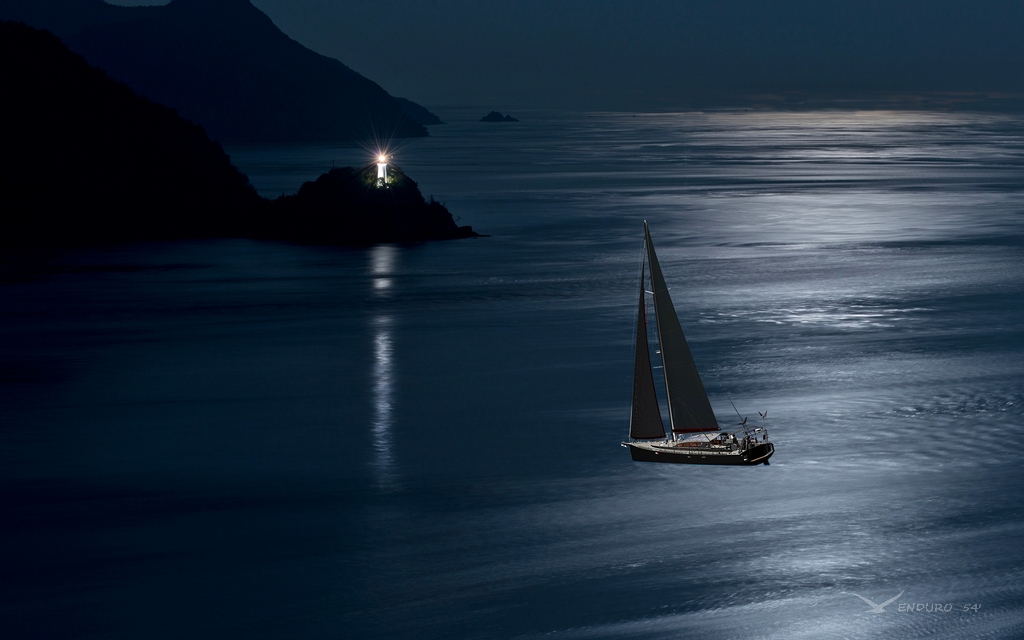  sailboat under moonlight Alaska
